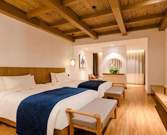 Imagen de la habitación del Hotel Floral Hotel Su Pu Exhibition Center. Foto 19