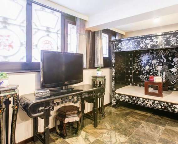 Imagen de la habitación del Hotel Floral Hotel Sui Yuan Pingyao. Foto 14