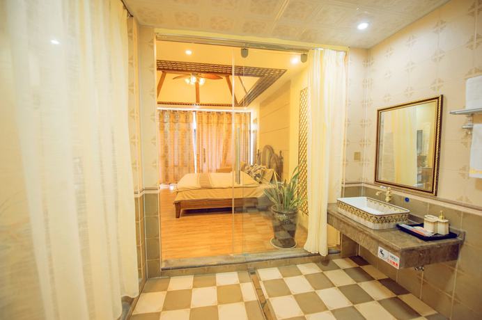 Imagen de la habitación del Hotel Floral Hotel Tengchong Heshun Hemuju. Foto 2
