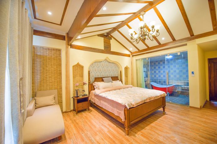 Imagen de la habitación del Hotel Floral Hotel Tengchong Heshun Hemuju. Foto 4