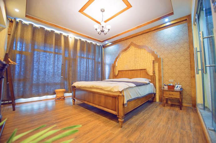 Imagen de la habitación del Hotel Floral Hotel Tengchong Heshun Hemuju. Foto 5