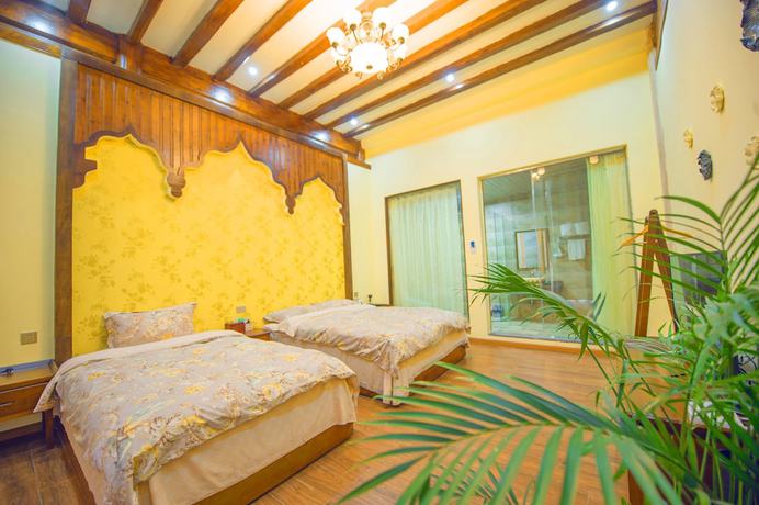 Imagen de la habitación del Hotel Floral Hotel Tengchong Heshun Hemuju. Foto 7