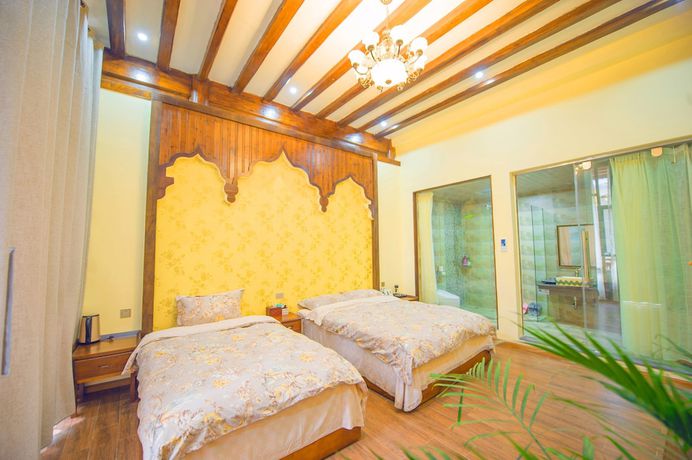 Imagen de la habitación del Hotel Floral Hotel Tengchong Heshun Hemuju. Foto 9