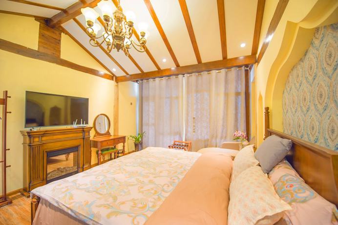 Imagen de la habitación del Hotel Floral Hotel Tengchong Heshun Hemuju. Foto 10