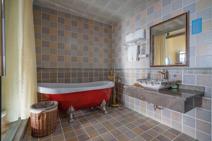 Imagen de la habitación del Hotel Floral Hotel Tengchong Heshun Hemuju. Foto 13