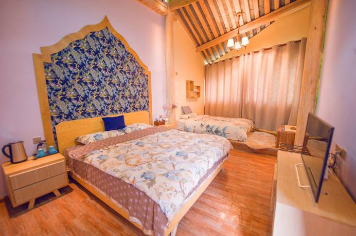 Imagen de la habitación del Hotel Floral Hotel Tengchong Heshun Hemuju. Foto 14