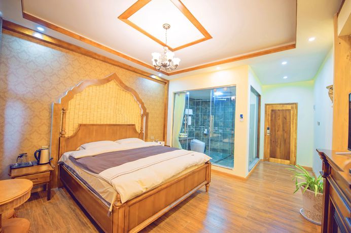 Imagen de la habitación del Hotel Floral Hotel Tengchong Heshun Hemuju. Foto 15