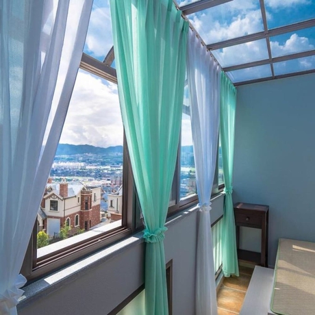 Imagen de la habitación del Hotel Floral Hotel Tengchong Yishuli Hotspring. Foto 5