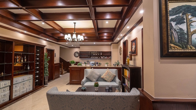 Imagen de los interiores del Hotel Floral Hotel Tengchong Yishuli Hotspring. Foto 17