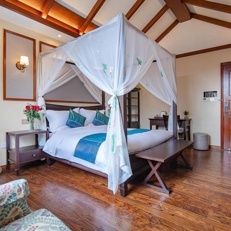 Imagen de la habitación del Hotel Floral Hotel Tengchong Yishuli Hotspring. Foto 10