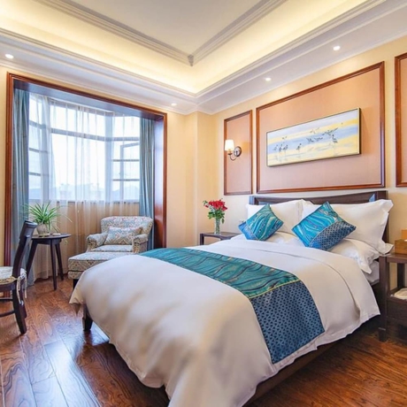 Imagen de la habitación del Hotel Floral Hotel Tengchong Yishuli Hotspring. Foto 11