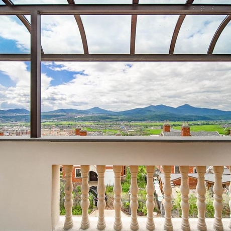 Imagen de la habitación del Hotel Floral Hotel Tengchong Yishuli Hotspring. Foto 14