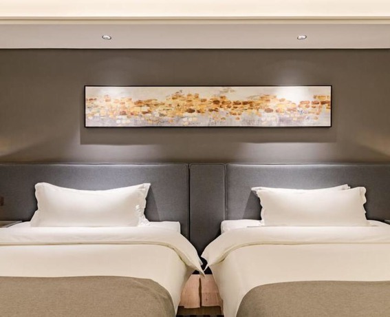 Imagen de la habitación del Hotel Floral Hotel Tian Cheng Airport. Foto 4