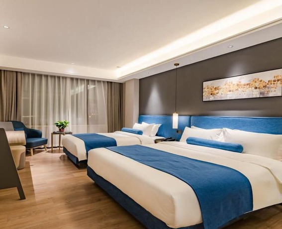 Imagen de la habitación del Hotel Floral Hotel Tian Cheng Airport. Foto 8