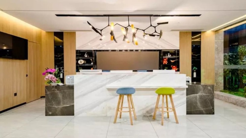 Imagen de los interiores del Hotel Floral Hotel Tian Cheng Airport. Foto 19