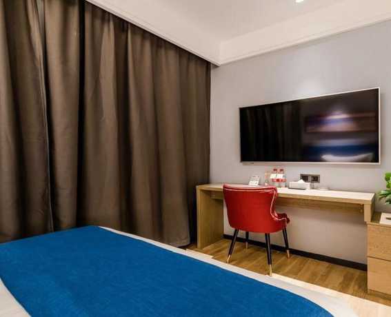 Imagen de la habitación del Hotel Floral Hotel Tian Cheng Airport. Foto 12