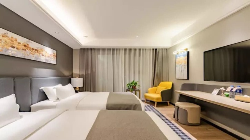 Imagen de la habitación del Hotel Floral Hotel Tian Cheng Airport. Foto 14
