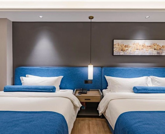 Imagen de la habitación del Hotel Floral Hotel Tian Cheng Airport. Foto 16