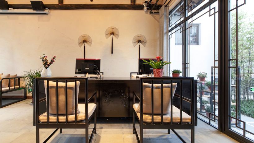 Imagen de los interiores del Hotel Floral Hotel Wuzhen Ziyemusu. Foto 16