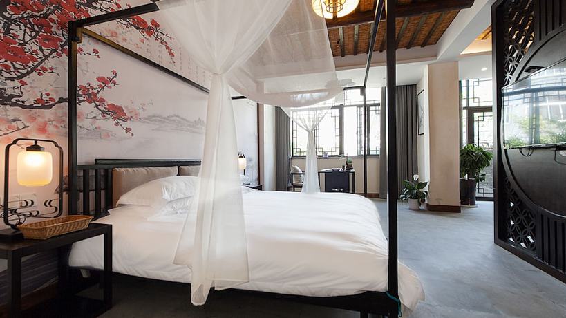 Imagen de la habitación del Hotel Floral Hotel Wuzhen Ziyemusu. Foto 4