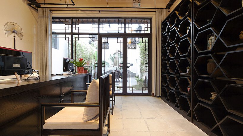 Imagen de los interiores del Hotel Floral Hotel Wuzhen Ziyemusu. Foto 18