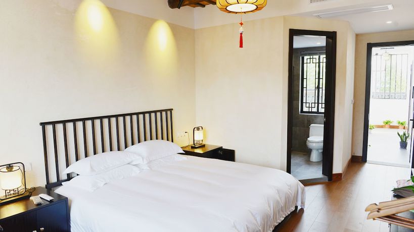 Imagen de la habitación del Hotel Floral Hotel Wuzhen Ziyemusu. Foto 10