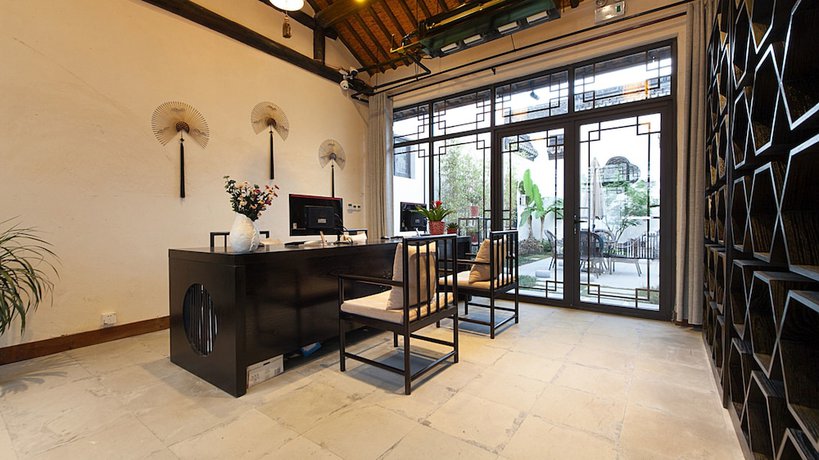 Imagen de los interiores del Hotel Floral Hotel Wuzhen Ziyemusu. Foto 19