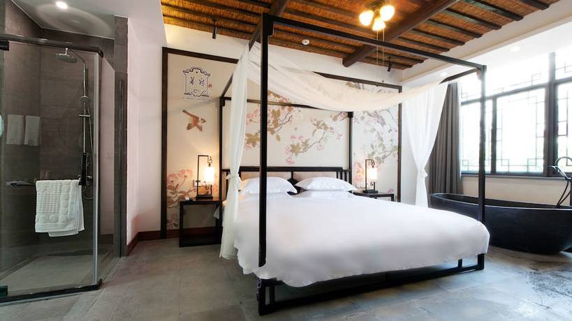Imagen de la habitación del Hotel Floral Hotel Wuzhen Ziyemusu. Foto 12