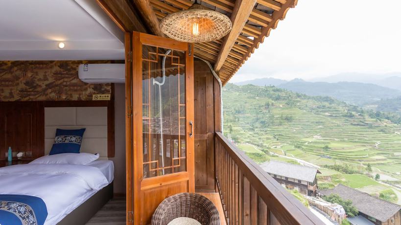 Imagen de la habitación del Hotel Floral Hotel Xijiang Banshan Yunfu. Foto 6