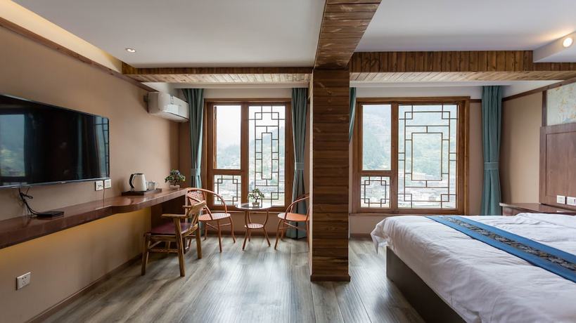 Imagen de la habitación del Hotel Floral Hotel Xijiang Banshan Yunfu. Foto 11