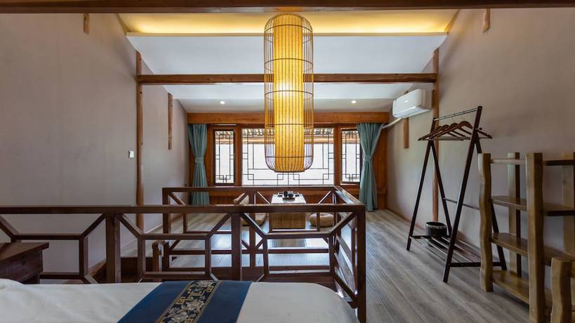 Imagen de la habitación del Hotel Floral Hotel Xijiang Banshan Yunfu. Foto 13