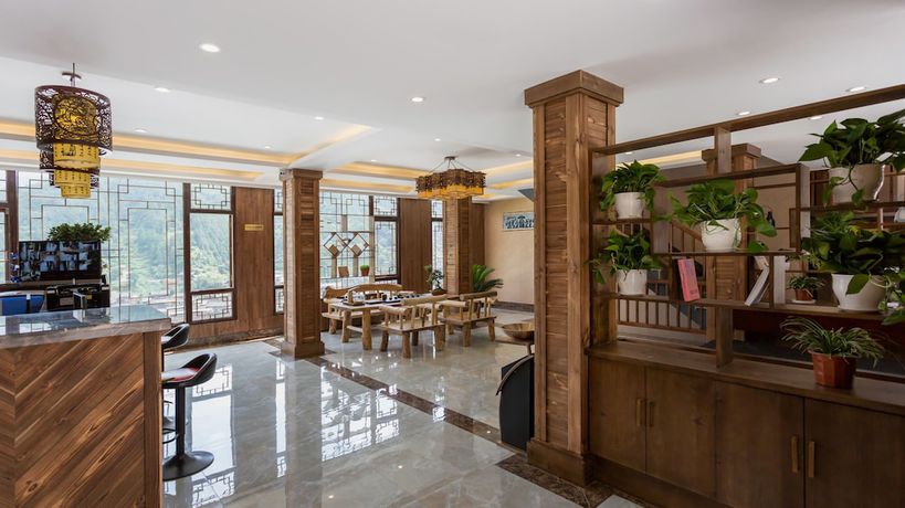 Imagen de los interiores del Hotel Floral Hotel Xijiang Banshan Yunfu. Foto 19
