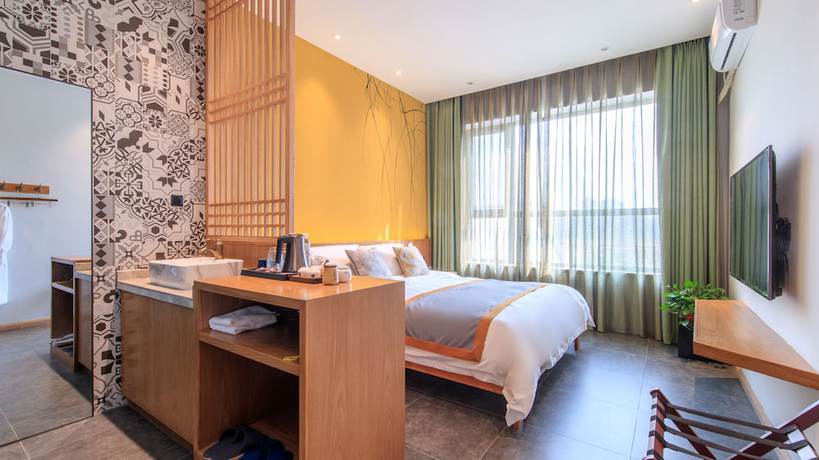 Imagen de la habitación del Hotel Floral Hotel Xiongan Lotus Court. Foto 3