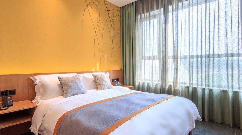 Imagen de la habitación del Hotel Floral Hotel Xiongan Lotus Court. Foto 6