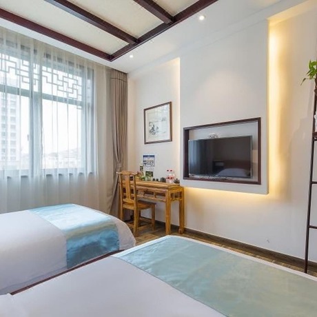 Imagen de la habitación del Hotel Floral Hotel Yuan Ju Hangzhou. Foto 7