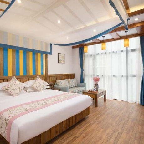 Imagen de la habitación del Hotel Floral Hotel Zhangjiajie Mengqi Meiju. Foto 3