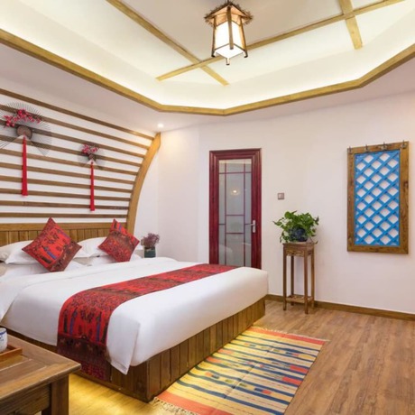Imagen de la habitación del Hotel Floral Hotel Zhangjiajie Mengqi Meiju. Foto 4
