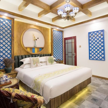 Imagen de la habitación del Hotel Floral Hotel Zhangjiajie Mengqi Meiju. Foto 6