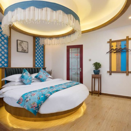 Imagen de la habitación del Hotel Floral Hotel Zhangjiajie Mengqi Meiju. Foto 7