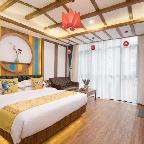 Imagen de la habitación del Hotel Floral Hotel Zhangjiajie Mengqi Meiju. Foto 8