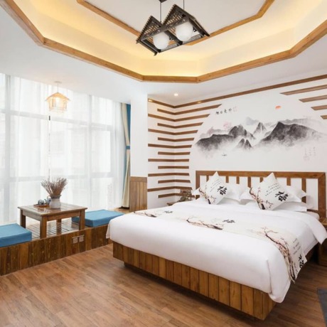 Imagen de la habitación del Hotel Floral Hotel Zhangjiajie Mengqi Meiju. Foto 9