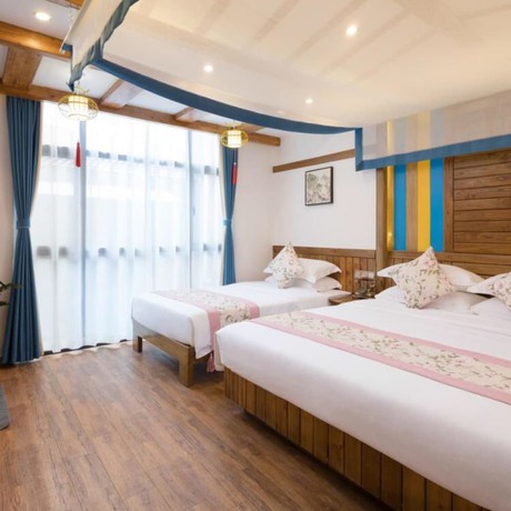 Imagen de la habitación del Hotel Floral Hotel Zhangjiajie Mengqi Meiju. Foto 10