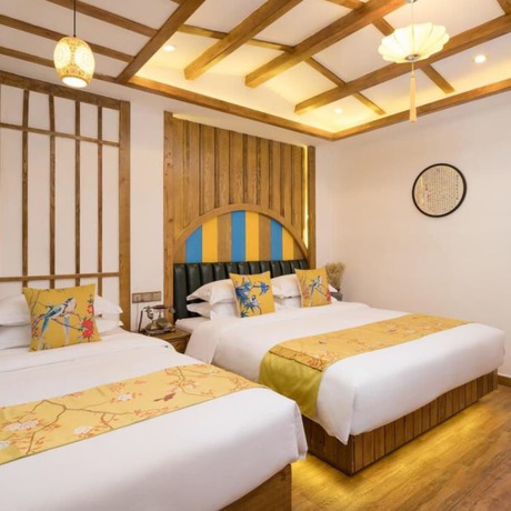 Imagen de la habitación del Hotel Floral Hotel Zhangjiajie Mengqi Meiju. Foto 13