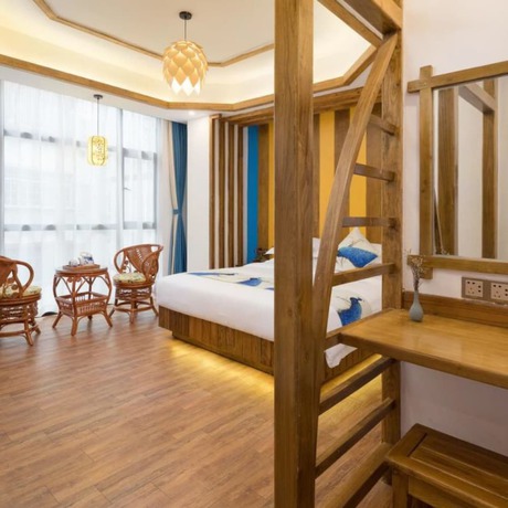 Imagen de la habitación del Hotel Floral Hotel Zhangjiajie Mengqi Meiju. Foto 15