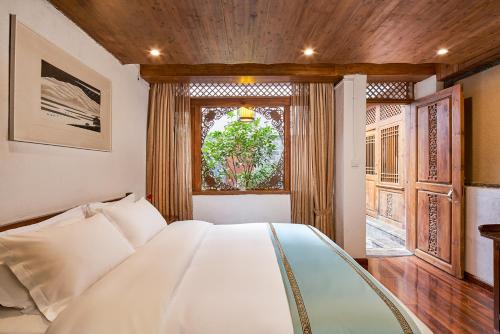 Imagen de la habitación del Hotel Floral Hotel &middot; Lijiang Fantu Boutique. Foto 4