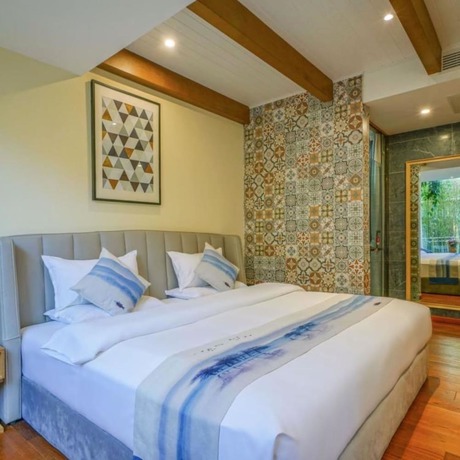 Imagen de la habitación del Hotel Floral Hotel &middot; Zai Yi Qi Lijiang. Foto 2