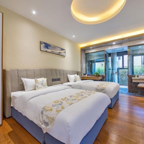Imagen de la habitación del Hotel Floral Hotel &middot; Zai Yi Qi Lijiang. Foto 10