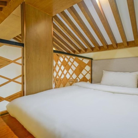 Imagen de la habitación del Hotel Floral Hotel &middot; Zai Yi Qi Lijiang. Foto 12