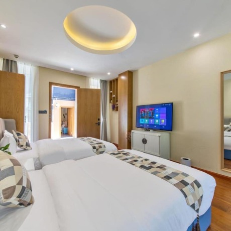 Imagen de la habitación del Hotel Floral Hotel &middot; Zai Yi Qi Lijiang. Foto 16