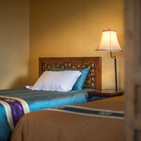Imagen de la habitación del Hotel Floral Limaroonthai Shuhe. Foto 12